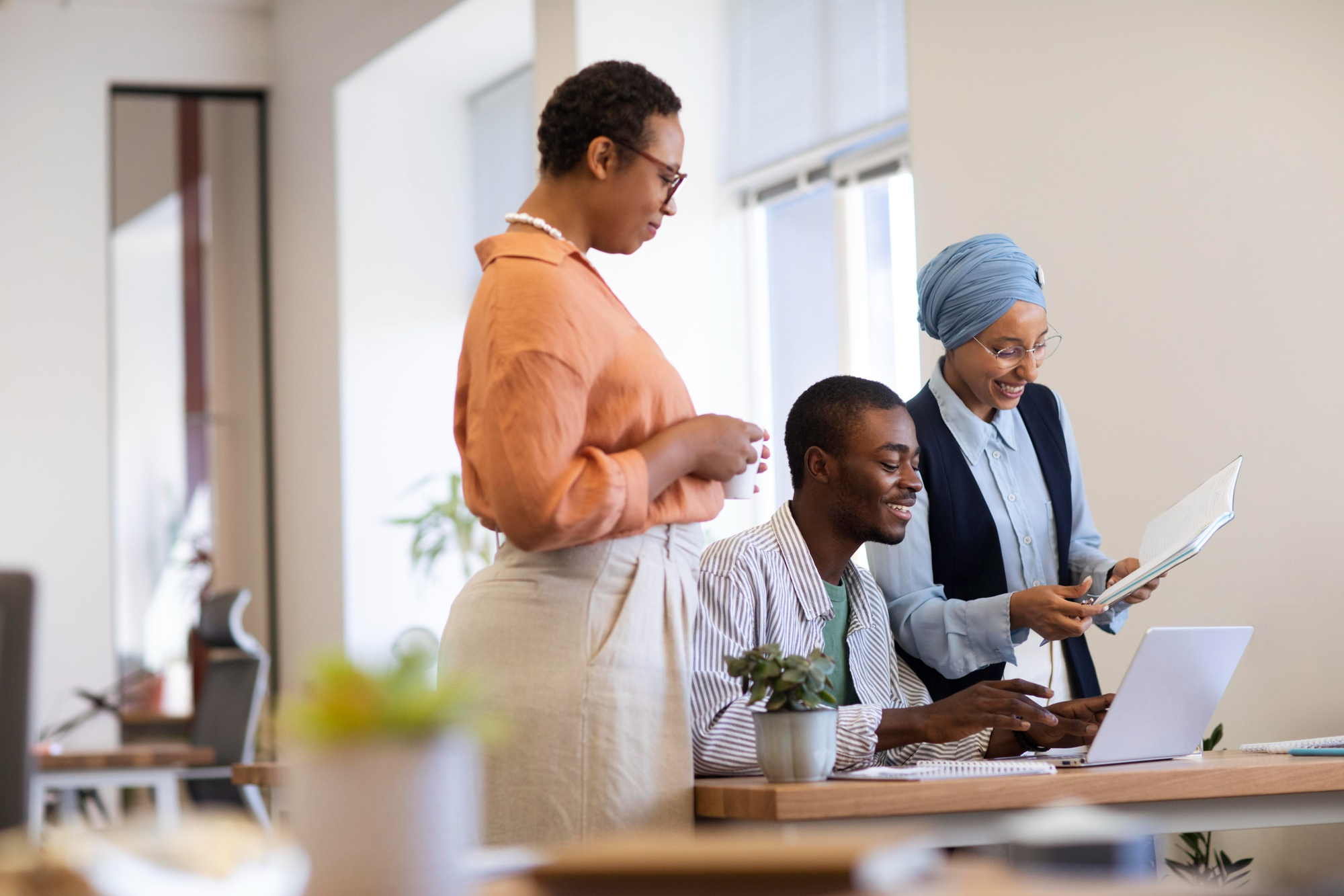 Ghanaian professionals collaborating in a modern office